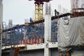 Asian labor people and thai labour worker use machine and heavy machinery working builder railway track electric sky train at