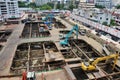 Asian labor people and thai labour worker use machine and heavy machinery working builder railway track electric sky train at