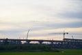 Asian labor people and thai labour worker use machine and heavy machinery working builder railway track electric skytrain at