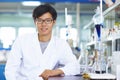 Asian Laboratory scientist working at lab with test tubes Royalty Free Stock Photo