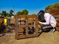 an asian labour welding on iron structure during indian railway bridge construction in india January 2020 Royalty Free Stock Photo