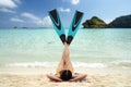 Asian lady in bilini relax wit fins and sleep on the beach in summer time at Koh Kood Royalty Free Stock Photo