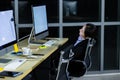 Asian lady call center worker employee sleeping on dest at night Royalty Free Stock Photo