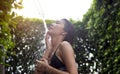 Asian lady shower outdoor for relax. Royalty Free Stock Photo