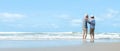 Asian Lifestyle senior couple dancing on the beach happy and relax time.  Tourism elderly family travel leisure and activity after Royalty Free Stock Photo