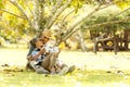 Asian Lifestyle senior couple drinking coffee  in the nature park Royalty Free Stock Photo