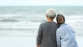 Asian Lifestyle senior couple hug on the beach happy in love romantic and relax time. Royalty Free Stock Photo