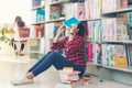 Asian lifestyle women sleeping after read books for education in library Royalty Free Stock Photo
