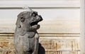 Asian lion statue wear hat Royalty Free Stock Photo