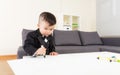 Asian little boy drawing picture Royalty Free Stock Photo