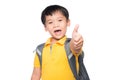 Asian little boy giving you thumbs up over white background Royalty Free Stock Photo