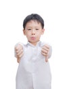 Asian little boy making thumbs down gesture with both hands