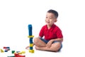 Asian little boy playing with colorful blocks Royalty Free Stock Photo