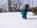 Asian Little Boy playing Snow Happily Royalty Free Stock Photo