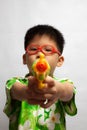 Asian little boy playing toy Royalty Free Stock Photo