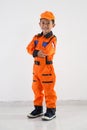 Asian little boy with technician, engineer or astronaut uniform