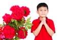 Asian Little Boy Wishing You Happy Chinese New Year with Congratulation Gesture Royalty Free Stock Photo