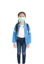 Asian little child girl in casual school uniform wearing medical mask with backpack raise hands up isolated on white background. Royalty Free Stock Photo