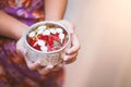 Asian little child girl holding a little bowl for pouring on hands of elderly Royalty Free Stock Photo