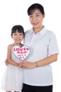 Asian Little Chinese Girl celebrating mother`s day with her mom Royalty Free Stock Photo