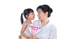 Asian Little Chinese Girl celebrating mother`s day with her mom Royalty Free Stock Photo