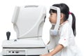 Asian Little Chinese Girl Doing Eyes Examination Through Auto re Royalty Free Stock Photo