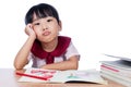 Asian Little Chinese girl drawing with color pencils Royalty Free Stock Photo