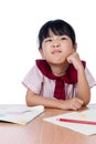 Asian Little Chinese girl drawing with color pencils Royalty Free Stock Photo