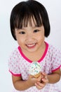 Asian Little Chinese Girl Eating Ice Cream Royalty Free Stock Photo