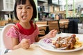 Asian Little Chinese Girl Eating Western Food Royalty Free Stock Photo