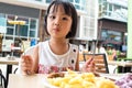 Asian Little Chinese Girl Eating Western Food
