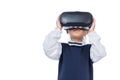 Asian little Chinese girl experiencing virtual reality via VR go