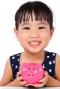 Asian Little Chinese Girl Holding Piggy Bank Royalty Free Stock Photo