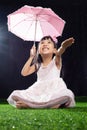 Asian Little Chinese Girl holding umbrella Royalty Free Stock Photo