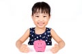 Asian Little Chinese Girl Hugging Piggy Bank Royalty Free Stock Photo