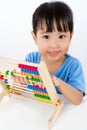 Asian Little Chinese Girl Playing Colorful Abacus Royalty Free Stock Photo