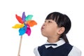 Asian Little Chinese Girl Playing Colorful Pinwheel