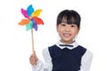 Asian Little Chinese Girl Playing Colorful Pinwheel Royalty Free Stock Photo