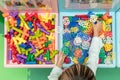 Asian Little Chinese Girl playing puzzle