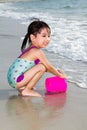 Asian Little Chinese Girl Playing Sand with Beach Toys