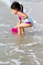 Asian Little Chinese Girl Playing Sand with Beach Toys Royalty Free Stock Photo