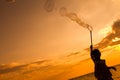 Asian Little Chinese Girl Playing Soap Bubbles on the Beach Royalty Free Stock Photo