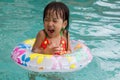 Asian Little Chinese Girl Playing in Swimming Pool Royalty Free Stock Photo