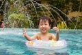 Asian Little Chinese Girl Playing in Swimming Pool Royalty Free Stock Photo