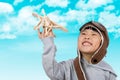 Asian Little Chinese Girl Playing with Toy Airplane Royalty Free Stock Photo