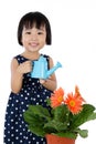 Asian Little Chinese Girl Watering Flower Royalty Free Stock Photo