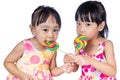 Asian Little Chinese girls eating lollipop