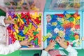 Asian Little Chinese Girls playing puzzle