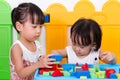 Asian Little Chinese Girls Playing Wooden Blocks