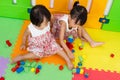 Asian Little Chinese Girls Playing Wooden Blocks